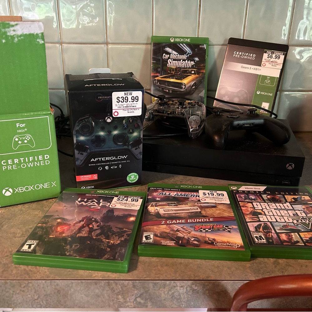 XBox One X with 2 controllers and 5 games